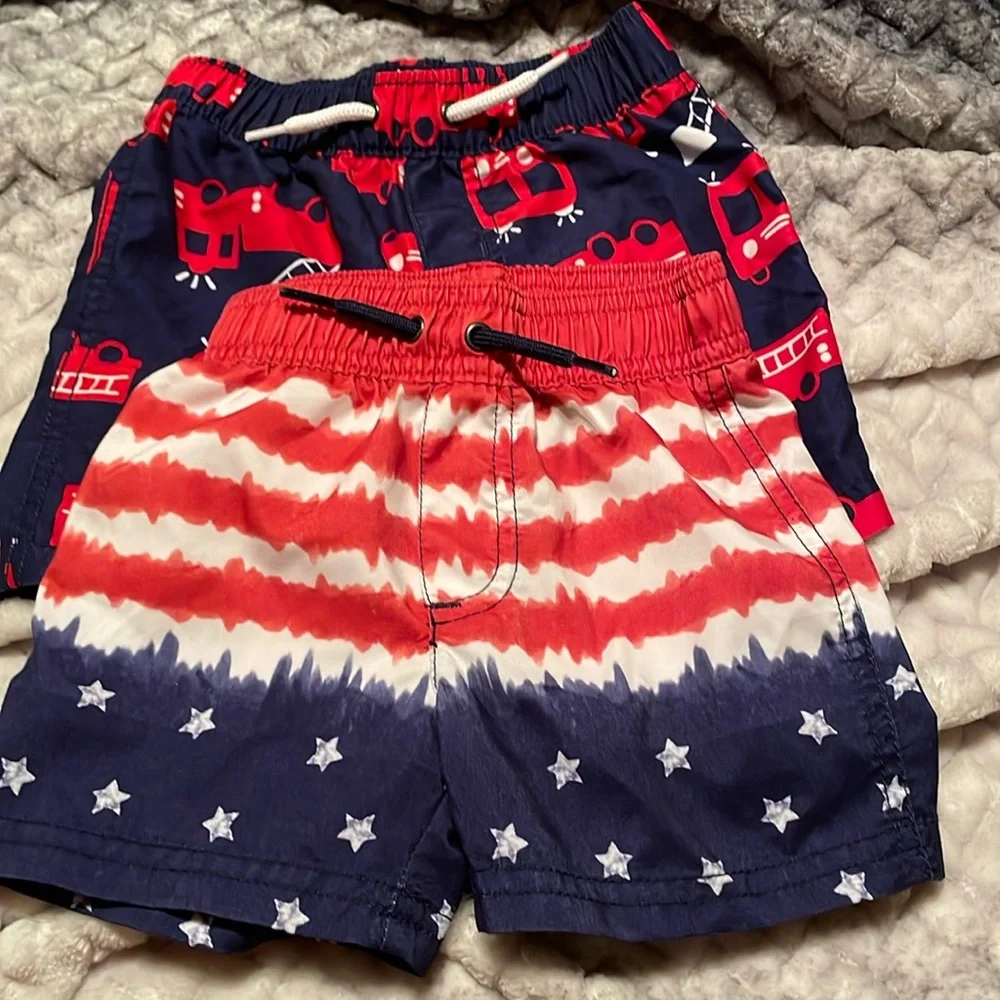 Carter’s~2 Boys Swim Shorts in Red, White and Blue. Elastic Waistband Size:12M